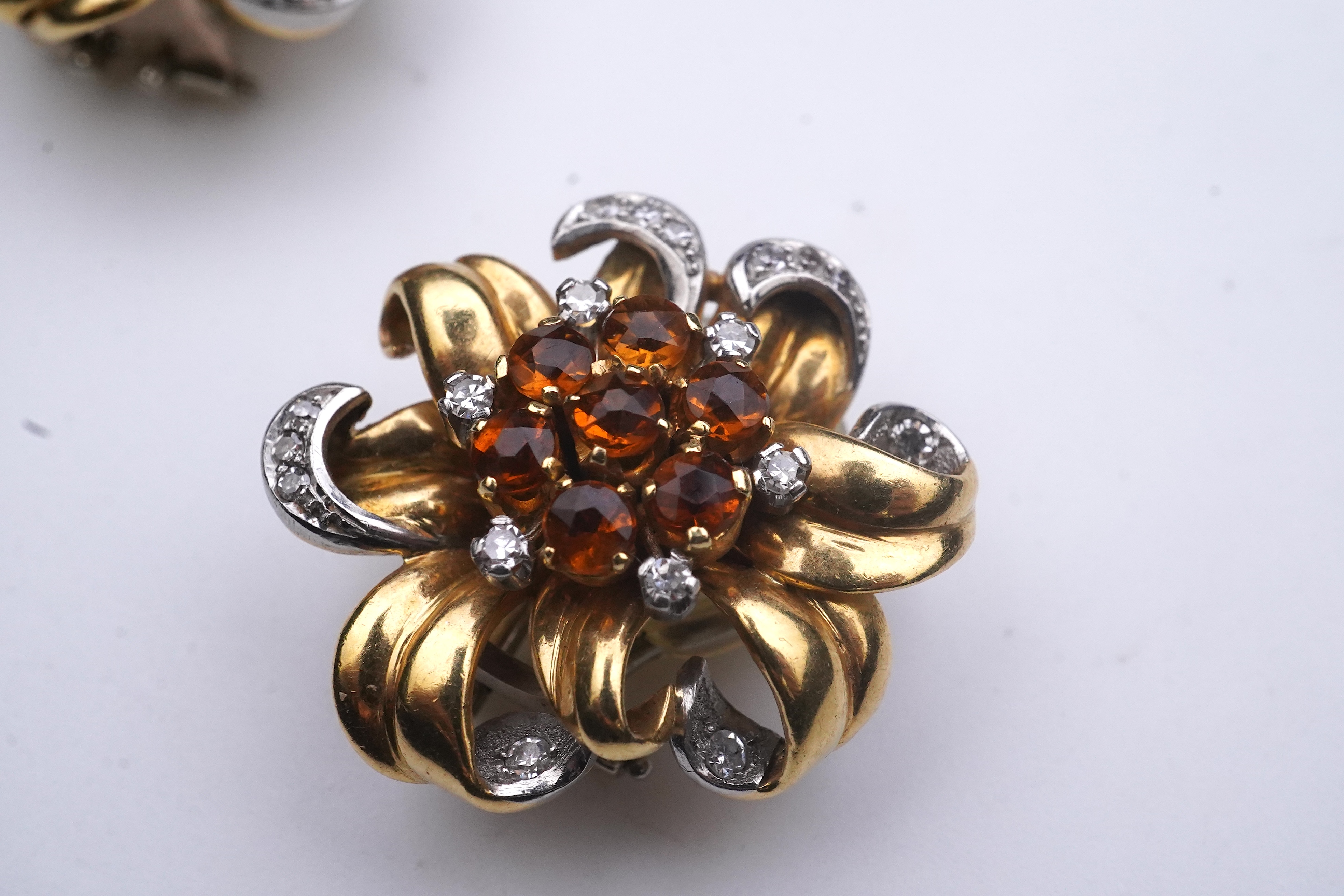 A pair of Retro citrine and diamond ear clips, circa 1940